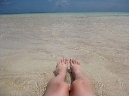 feet on the beach