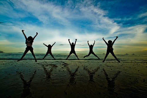 jumping jacks on the beach