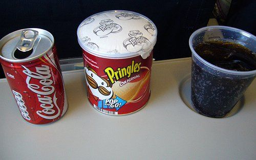 coke and pringles on a plane