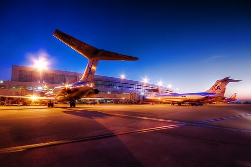 airplanes waiting at gate